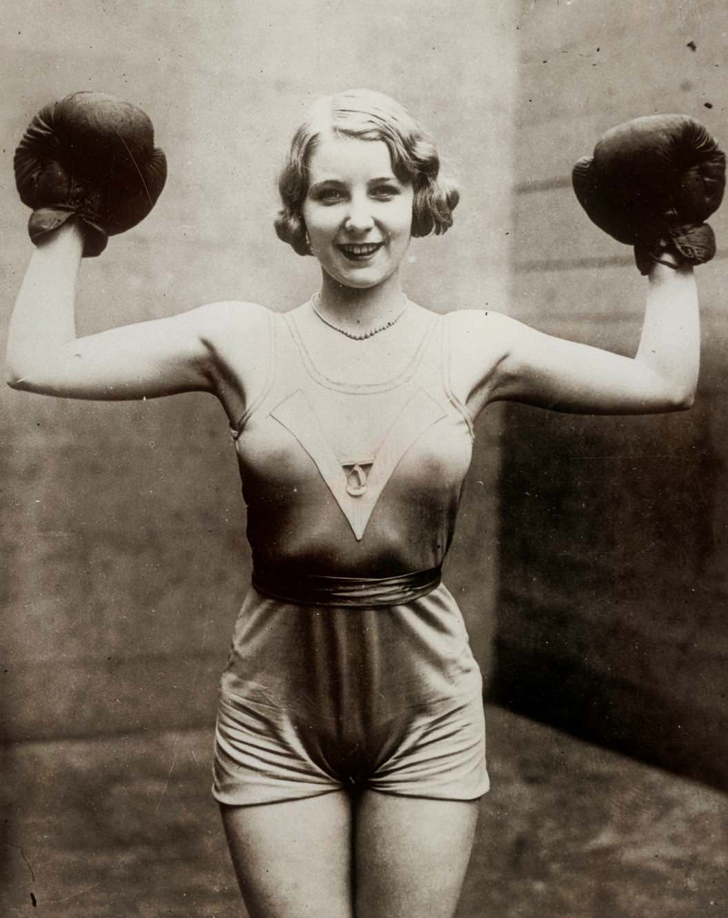 Irish women's boxing champion Elsie Connor showing off for a magazine in preparation for a fight in 1931.