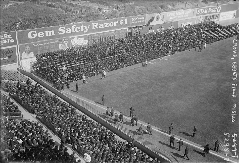 Ebbets field, home of the Brooklyn Dodgers (NYC, US), in 1920. Notice how the fans walked on the foul grounds to get to their seats.