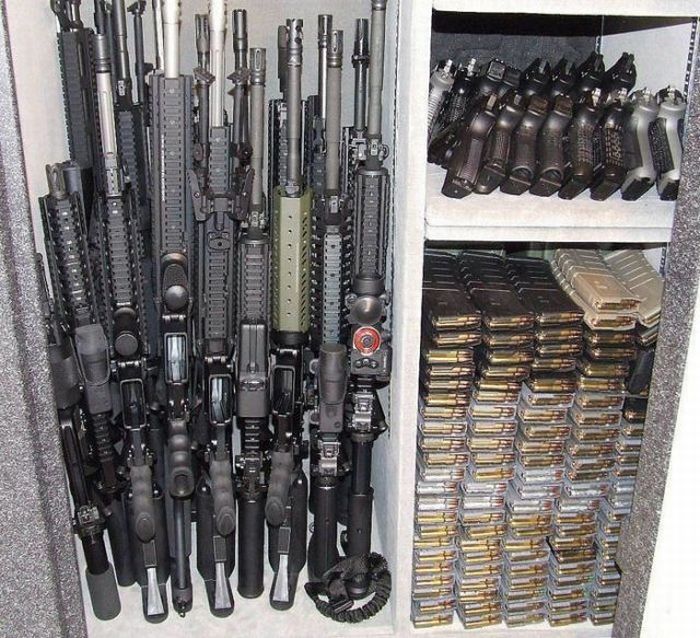 gun safe full of guns -
