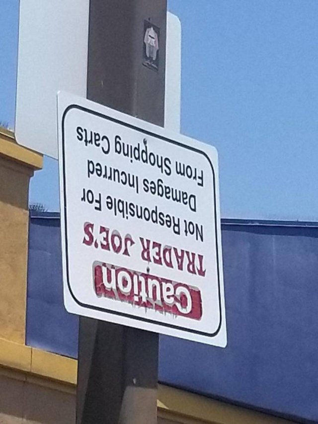 street sign - cuorines Trader Joe'S Not Responsible For pningul sabewed Sieg Buddous wory