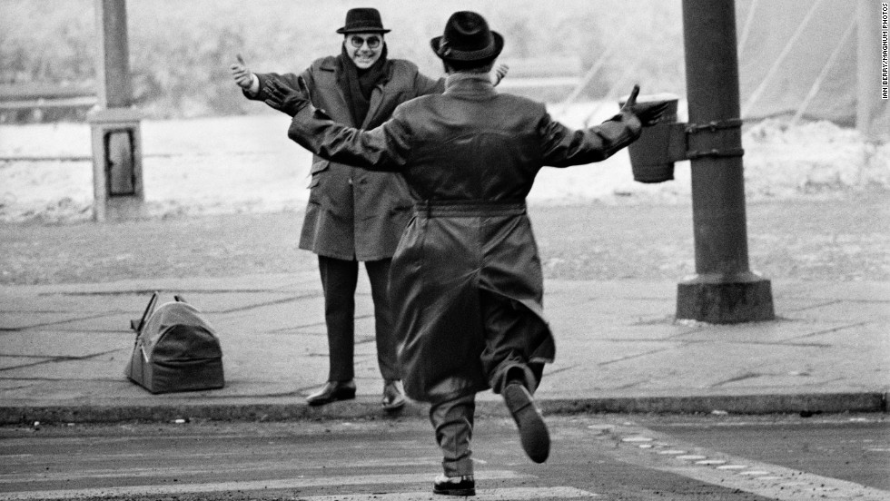 A man greets his brother after arriving in East Berlin, Germany in 1963. This was 2 years after the Berlin Wall was erected, dividing the city. For the holiday season, East Germany allowed West Germans to obtain a 1 day pass to visit family members. It was one of the only times anyone was allowed to cross freely before the wall was torn down in 1989.