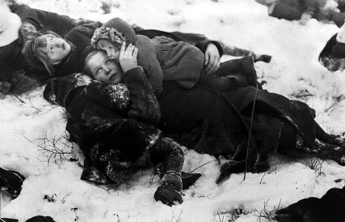 A mother and her 3 children take cover during a Soviet air raid in Finland during the Winter War in 1939. The Soviets invaded Finland, trying to secure territory changes. The near 5 month war was a huge surprise to the Soviets as the vastly outnumbered Fins held them off with the help of heavy snow, snipers, and strong guerilla tactics. This war also helped convince the Nazi's to eventually attack the Soviets, knowing they were unprepared for such a war. Finland also allied itself with the Axis powers because the enemy of my enemy is my friend.