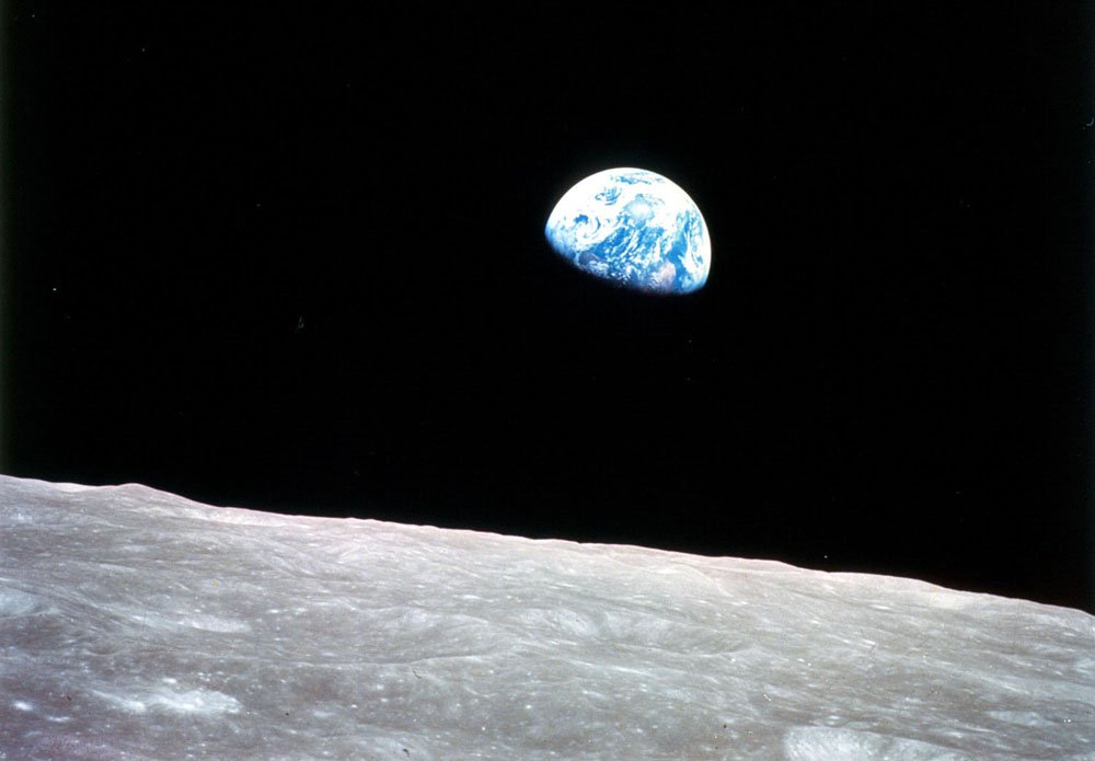 Apollo 8, the first manned mission to the moon, entered lunar orbit on Christmas Eve, Dec. 24, 1968. That evening, the astronauts-Commander Frank Borman, Command Module Pilot Jim Lovell, and Lunar Module Pilot William Anders-held a live broadcast from lunar orbit, in which they showed pictures of the Earth and moon as seen from their spacecraft. Said Lovell, “The vast loneliness is awe-inspiring and it makes you realize just what you have back there on Earth.” They ended the broadcast with the crew taking turns reading from the book of Genesis.