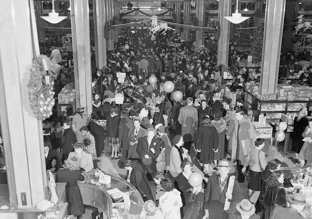 12/13/1947- New York, NY: The Christmas shopping rush. With only ten shopping days left before Christmas, buyers throng the main floor of a Macy’s department store December 13th.