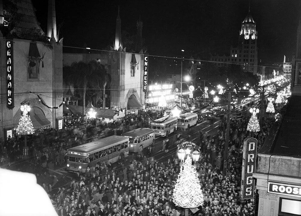 11/26/1939- Hollywood, CA- Hollywood, film capitol of America, cast aside the serious side of life and went into a gala holiday mood with its recent Christmas Parade. Here is a picture of Hollywood Boulevard, the film capitol’s main thoroughfare that has been rechristened Santa Claus Lane for the holiday season, brilliantly illuminated as thousands of Southlanders turned out to see Santa Claus and movie celebrities take part in the gala parade.