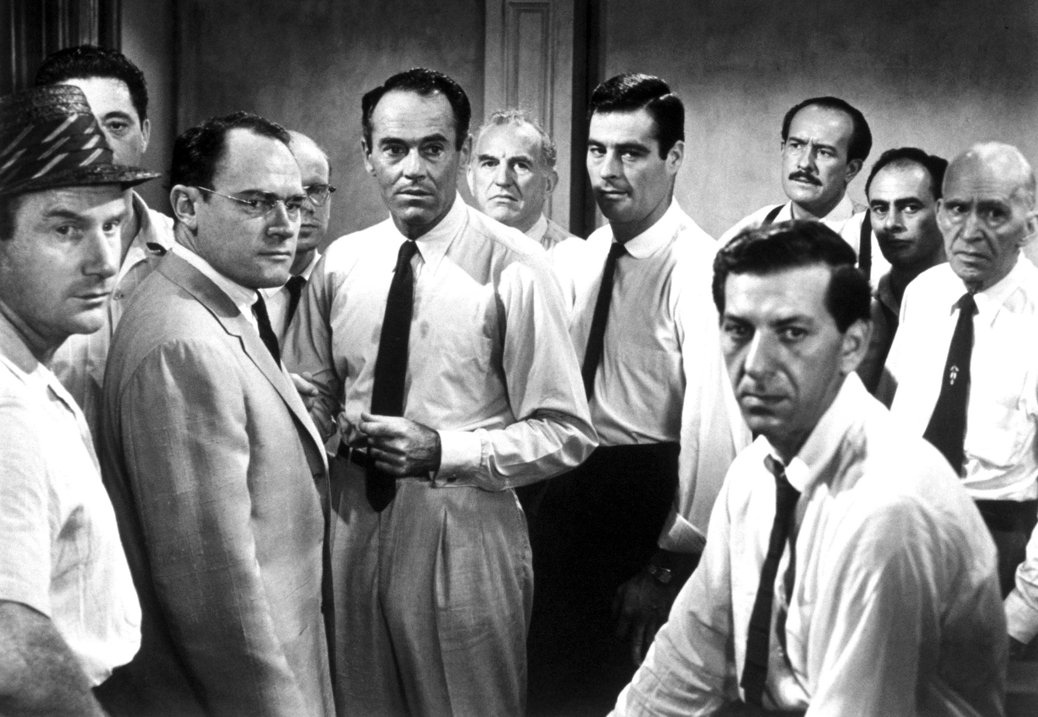 12 Angry Men (1957) - Set in one jury room, with twelve disgruntle jurors, the unraveling of what people believe to be truth and justice is put on the table. Henry Fonda plays Juror 8, the only man who thinks the young inner city boy, who is accused of stabbing his father, is innocent. Over the course of the day, he tries to convince the other men that there are way too many discrepancies with the story to convict the teen.
