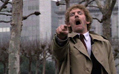 Invasion of the Body Snatchers (1978) - One of the coolest and creepiest sci-fi movies of all time, Invasion of the Body Snatchers is a movie where the good guys in no way win. Donald Sutherland's character, a health inspector in San Francisco, is on to the outbreak of weird pod inhabiting creatures that are taking over people's bodies in the city. The final shot is of Sutherland's character walking to work at City Hall when one of the young women he is protecting throughout the film approaches him. He looks at her for a second and then starts pointing for people to seize her, but only admitting from his mouth this awful alien scream. It will give you chills for days.
