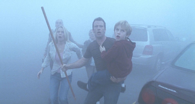 The Mist - A group of strangers hold up in a supermarket after a mysterious mist forms outside of the shop, holding within it terrifying prehistoric monsters. One shopper, the main character David Drayton, and his young son try to keep things calm as they decide an escape plane. The end of the film finds David taking his son, a woman and two elderly shoppers out of the supermarket and driving south. After finding his wife dead at their home and running out of gas he shoots the two elderly people in the back seat, the woman, and his own son. He runs out of bullets and gets out of the car so he will be killed by the monster, only to see the mist lifting and the U.S. Army coming to restore order.