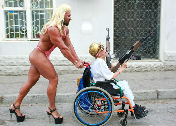 wtf russia man in a wheelchair with a gun - Tig