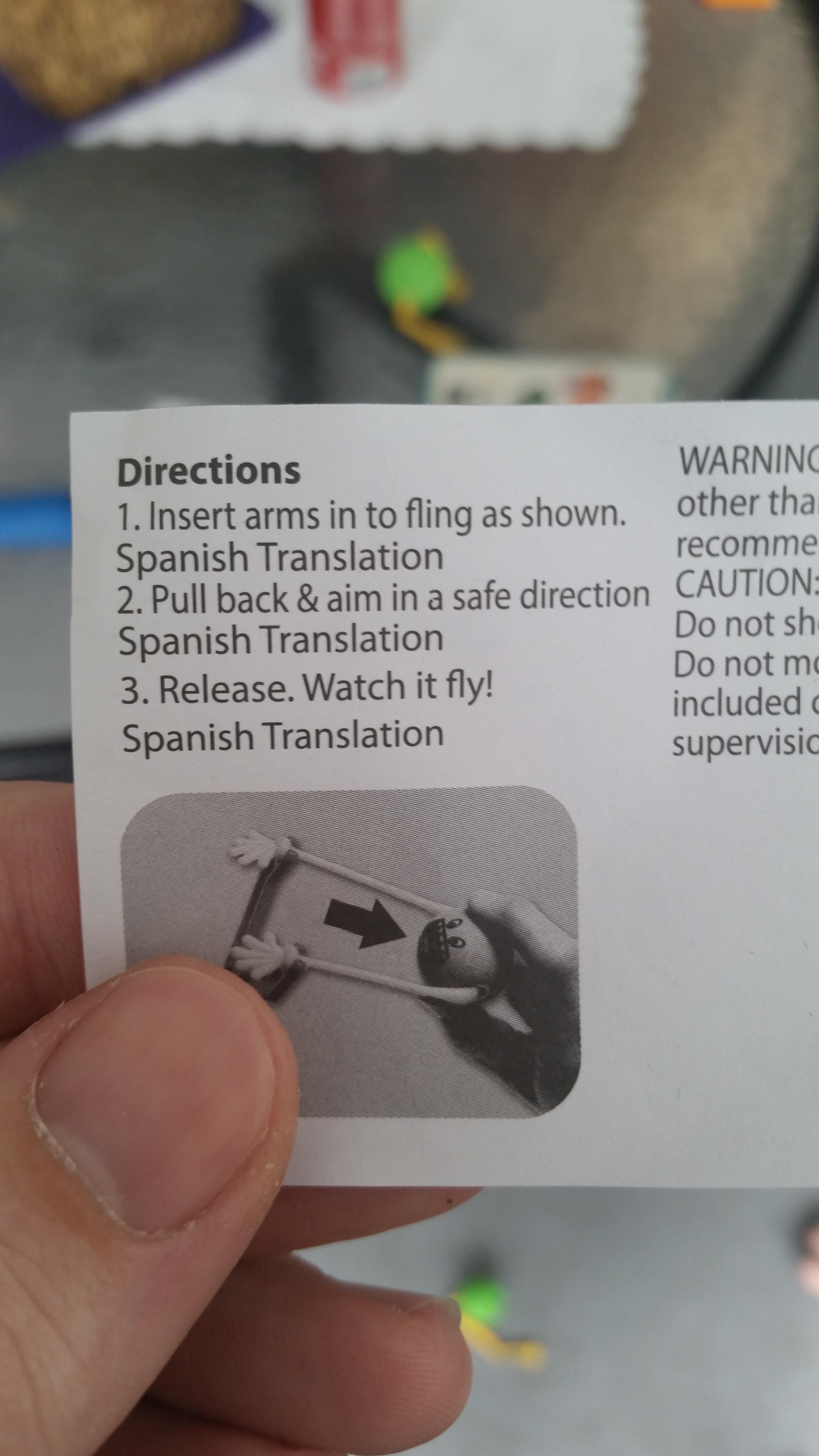 random pic nail - Directions Warning 1. Insert arms in to fling as shown. other tha Spanish Translation recomme 2. Pull back & aim in a safe direction Caution Spanish Translation Do not sh Do not me 3. Release. Watch it fly! included Spanish Translation s