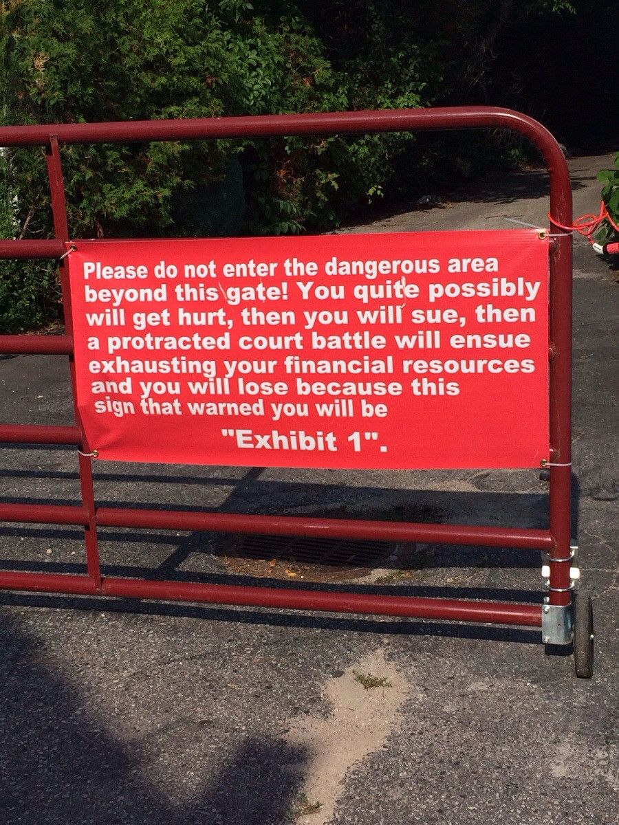 hilarious signs only found in texas - Please do not enter the dangerous area beyond this gate! You quite possibly will get hurt, then you will sue, then a protracted court battle will ensue exhausting your financial resources and you will lose because thi