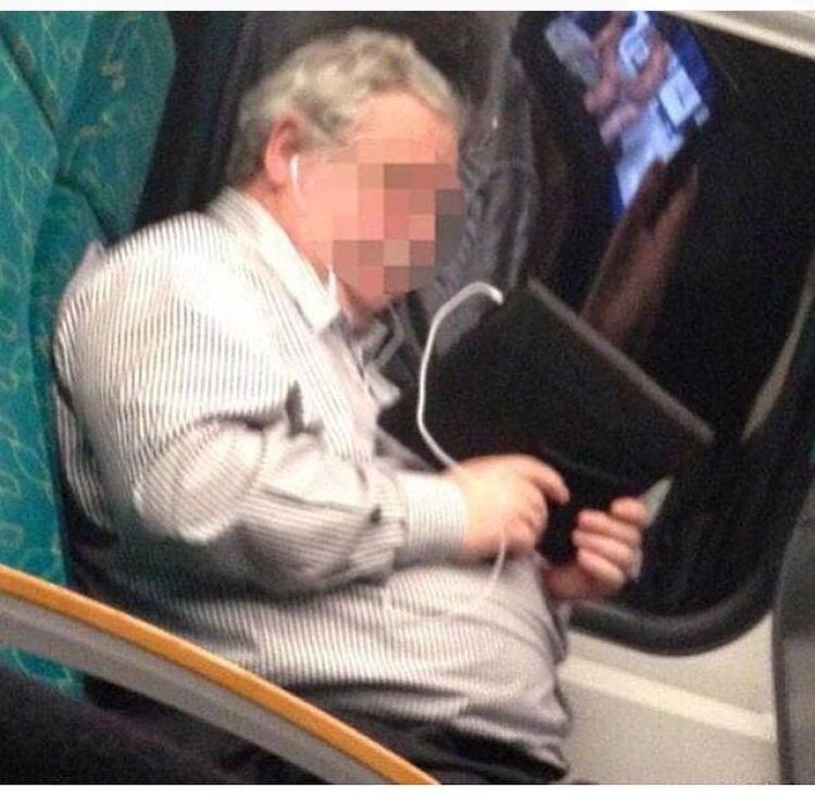 man watching porn on train