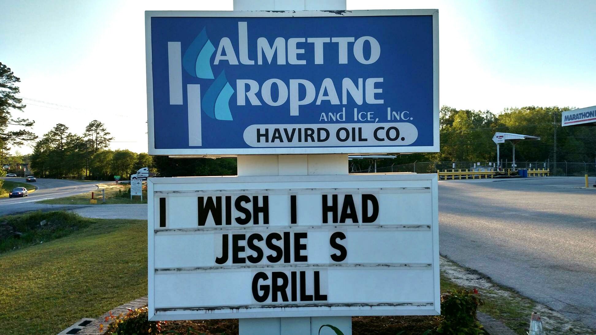 street sign - Almetto Tropane And Ice, Inc. Marathon Havird Oil Co. I Wish I Had Jessie S Grill