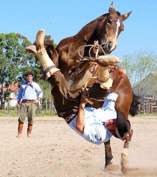 cowboy falling off horse