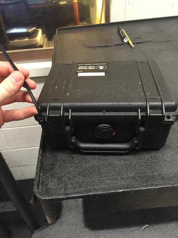 “Put the leather bag in a pelican case with a zip tie for safety, I forgot to get a picture but the next step was wrapping the pelican case airtight with shrink wrap.”