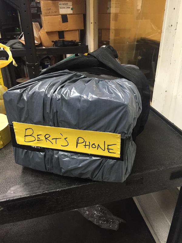 Guy Leaves His Phone At Work, Coworker Gives It The Fort Knox Treatment (13 Photos)