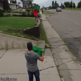 GIF of trying to dunk water on a bike rider and it goes wrong
