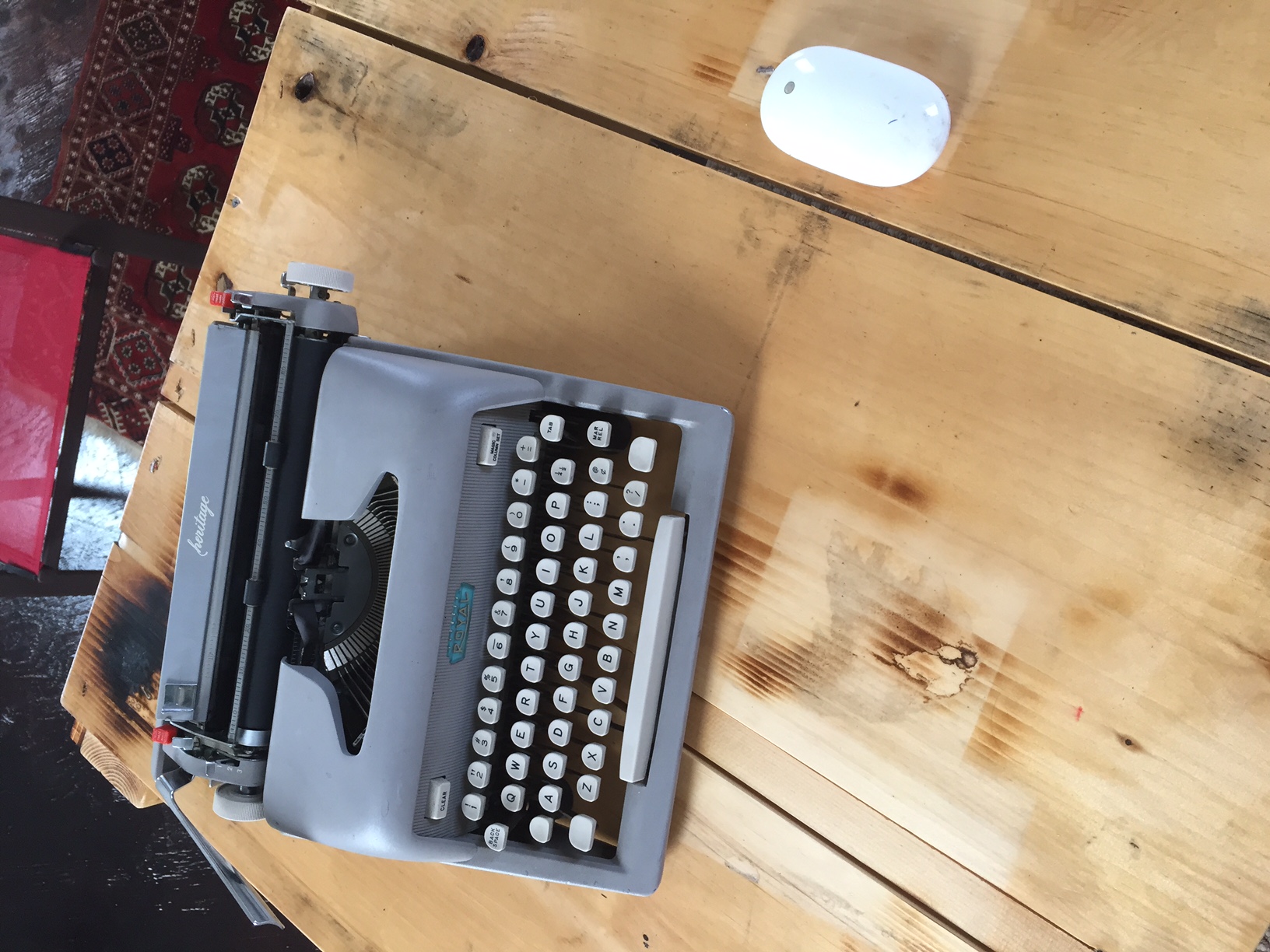 classic typewriter with a mouse