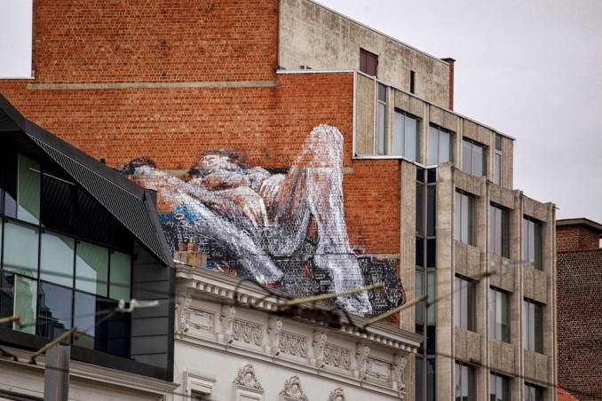 Explicit anonymous XXX scenes are appearing on the Brussels skyline with another piece popping up on Rue des Poissonniers