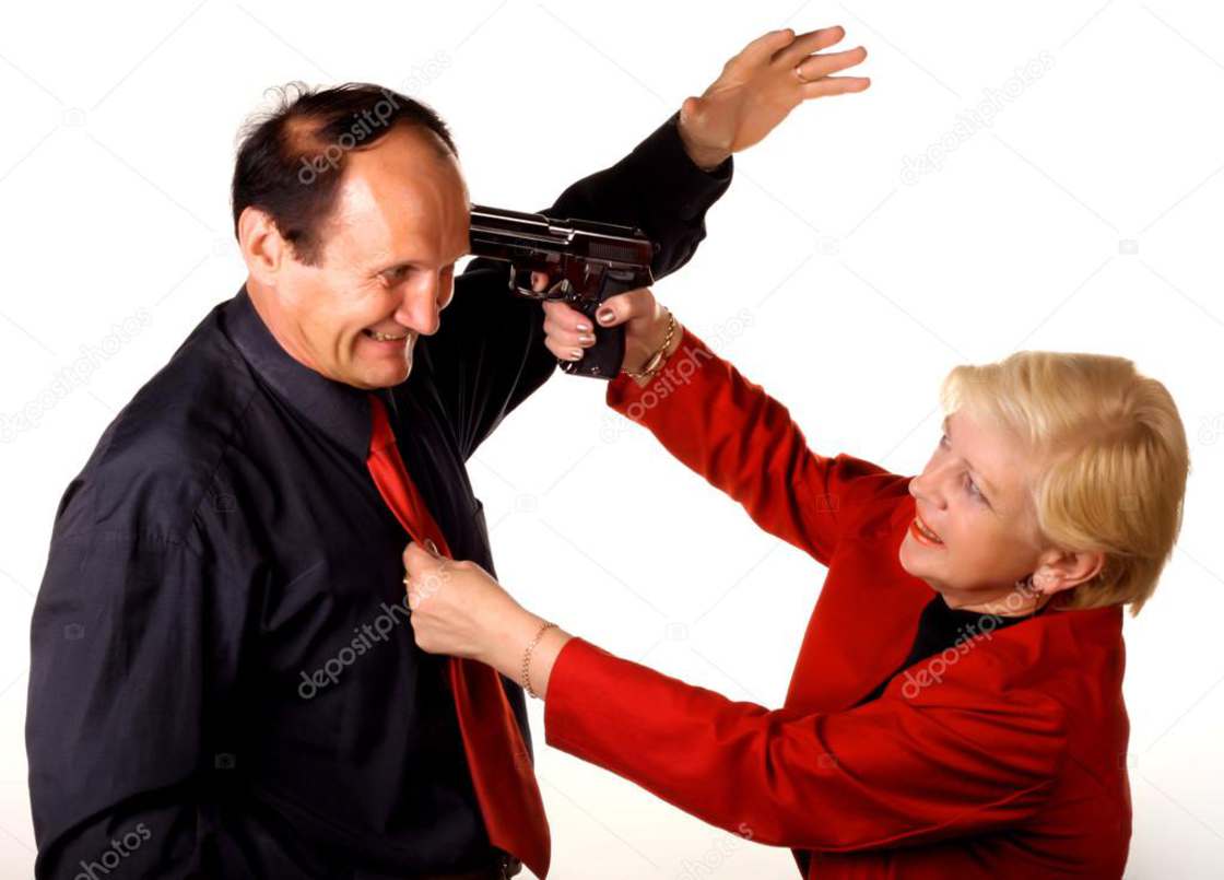 Grandma pistol whipping a middle aged man
