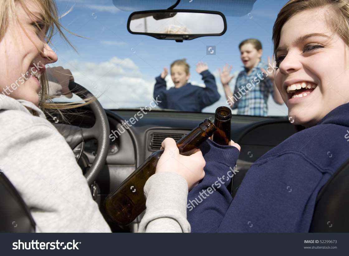 People driving and about to run over someone.