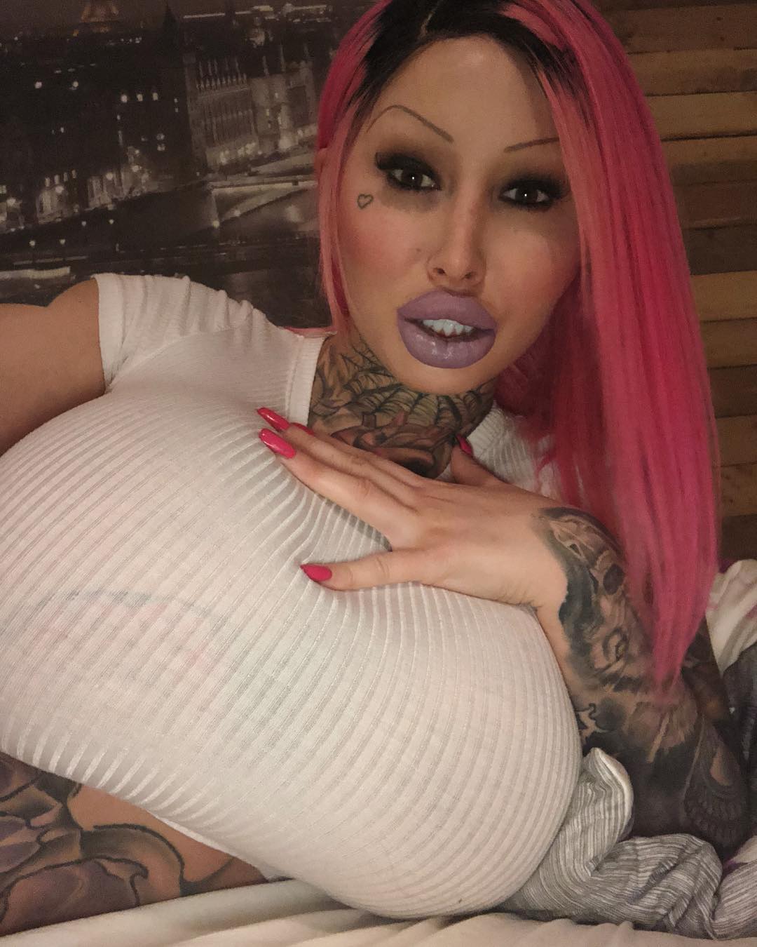 Mary Magdalene (24), from Toronto, Canada, following three boob jobs, over 15 lip procedures, butt implants and a Brazilian butt lift.