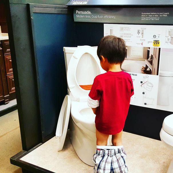 Kid peeing at an Ikea display