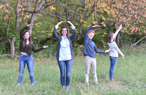 Mom tries to spell out love and kids have fun with it.