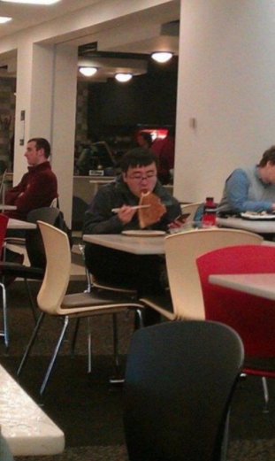 eating pizza with chopsticks