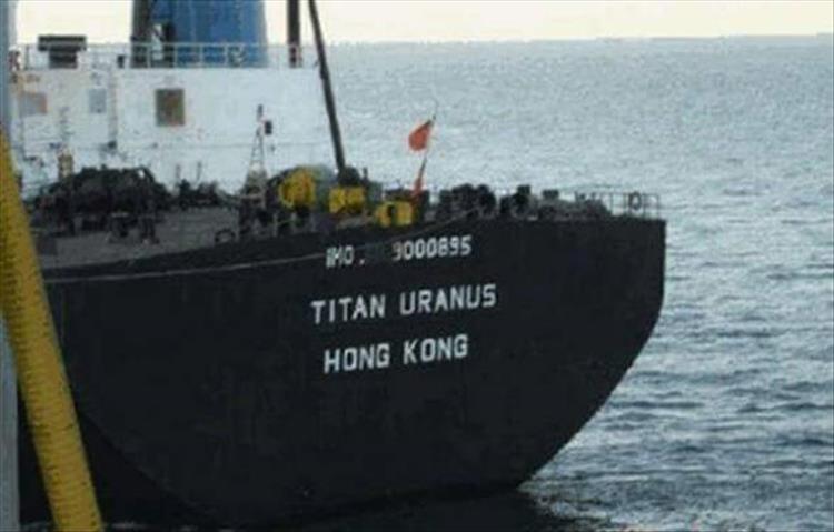 random pic of container ship named titan uranus hong kong
