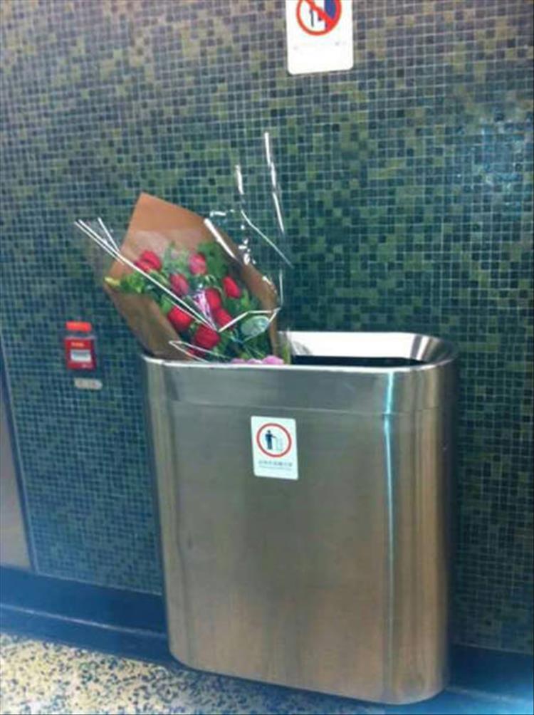 random pic of flowers in the trash that tell a little story