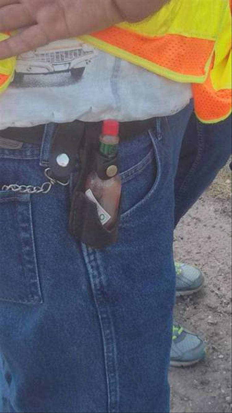 random pic of hot sauce holster on a pair of jeans.