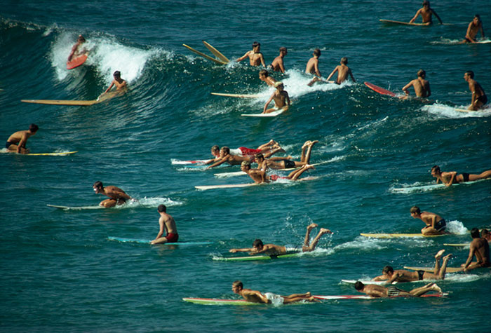 Surfers overpopulate the waves off of Bondi Beach in Australia, 1963Image source: Robert B. Goodman