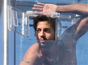 David Blaine is probably best known as a street magician and illusionist, but he is also an endurance artist. He has performed high profile feats of endurance and has broken and set several world records. His feats include being entombed in a plastic box for seven days, being encased in a block of ice for over 64 hours, and standing on a 100-foot high pillar for 35 hours. He is also well known for his Above the Below stunt where he was sealed inside a transparent plexiglass case suspended 9 metres in the air next to Potters Fields Park on the south bank of the River Thames in London. David Blaine went for 44 days without food or nutrients and just had 4.5 liters of water per day.