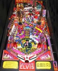 Elvis (2004)
Elvis pinball has a two level playing field, a dancing Elvis doll, and tons of color. The machine’s speakers play popular Elvis songs taken from the “68 Comeback” TV special and the “Aloha from Hawaii” TV Special. Most shots are long distance and fast; players must collect Elvis songs, win the Top Ten Countdown, and collect points to win the game.