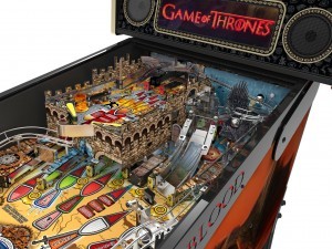 Game of Thrones (2015)
Game of Thrones is a brand-new pinball machine that I haven’t had the pleasure to play yet, but since I’m a huge fan of the TV series and books, I had to include it. Players choose to be a knight of either the Stark, Lannister, Greyjoy, Baratheon, Martell, or Tyrell house.  They must then choose another house to battle; the ultimate goal is to rule the seven kingdoms of Westeros. Rory McCann – the Hound – guides players through the game. Once players have reached a certain level of points, an elevator will carry the ball up to the castle and the Iron Throne.