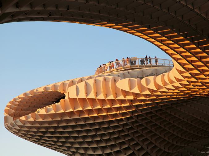 METROPOL PARASOL, SEVILLE
The Metropol Parasol at the Plaza de la Encarnacíon in Seville, Spain, is the largest wooden structure in the world. Completed in 2011, the multifunctional landmark—home to a museum, restaurants and bars, and a farmers market—offers shade below and panoramic views from up top.
PHOTOGRAPH BY DOROTHEA SCHMID, LAIF/REDUX