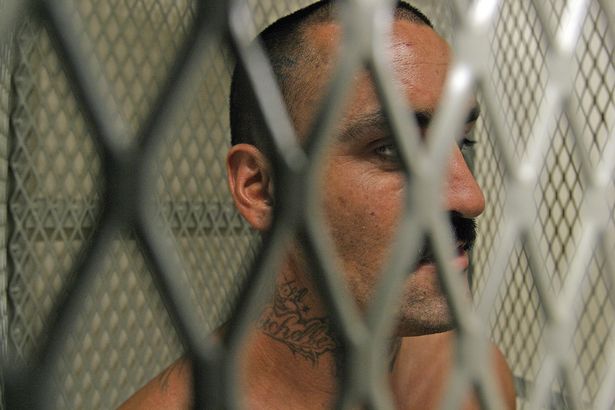 Chilling images show life inside America's most savage prison gangs and the brave inmates who defied their power