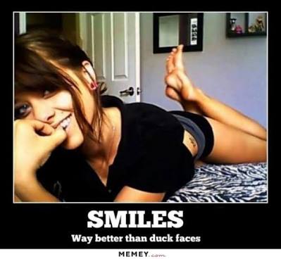 Dank meme about how smiles are better than putting on a duck face for a selfie.