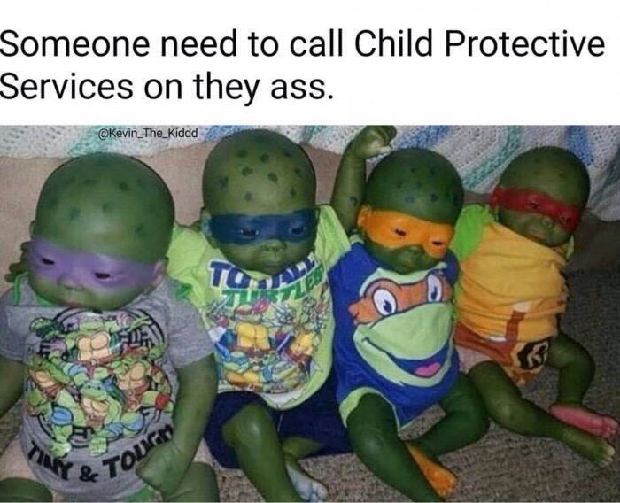 Picture of 4 babies painted and dressed like ninja turtles.