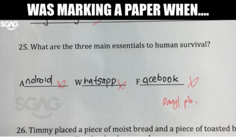 Funny picture of a test in which the kid wrote you need Android, Whatsapp and Facebook to survive.