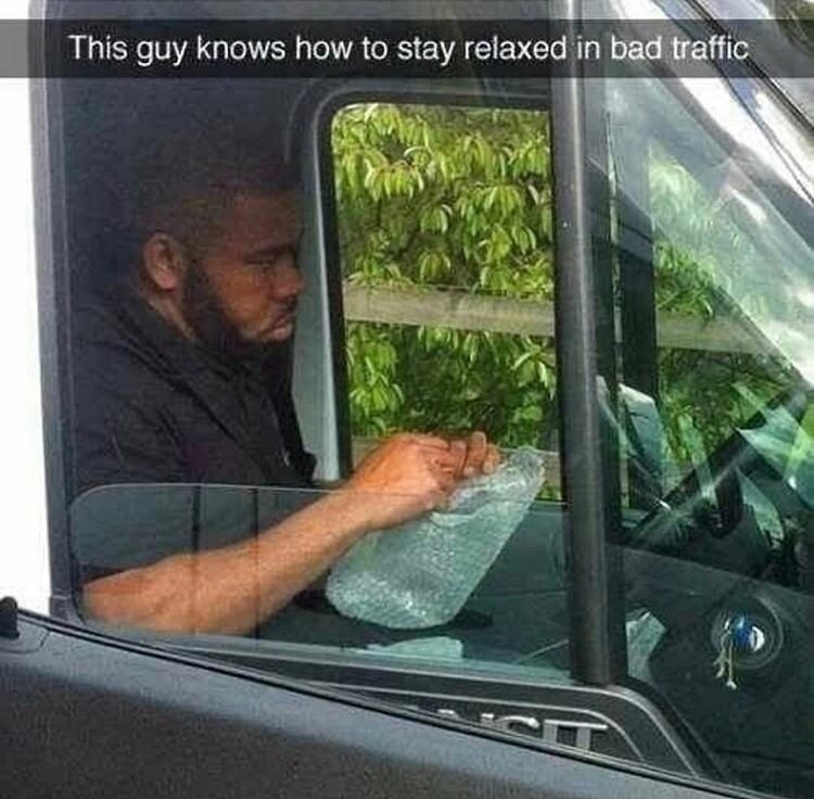 meme stream - traffic jam bubble wrap - This guy knows how to stay relaxed in bad traffic