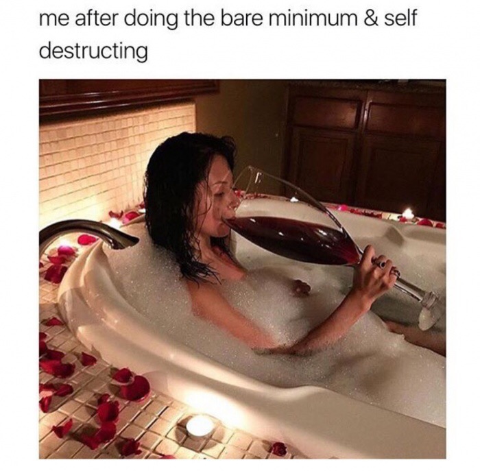 Funny meme of a picture of a woman in a bathtub with bubbles and a huge wine glass