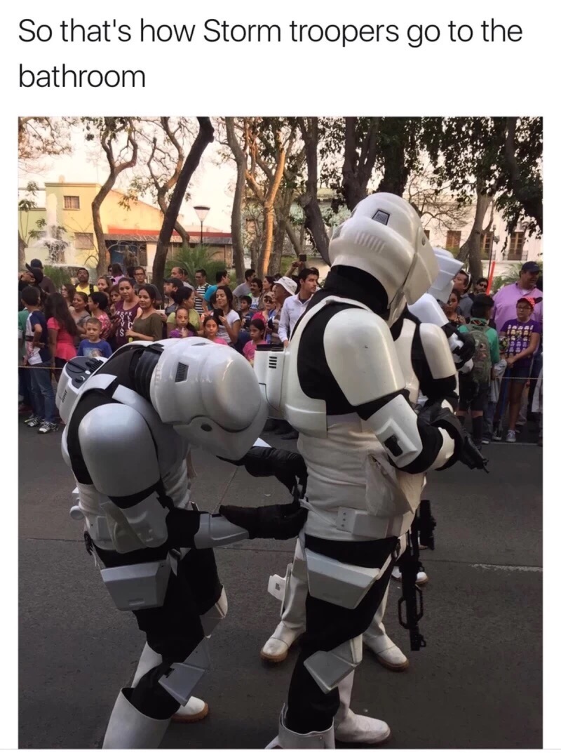 Stormtroopers helping each other get dressed.