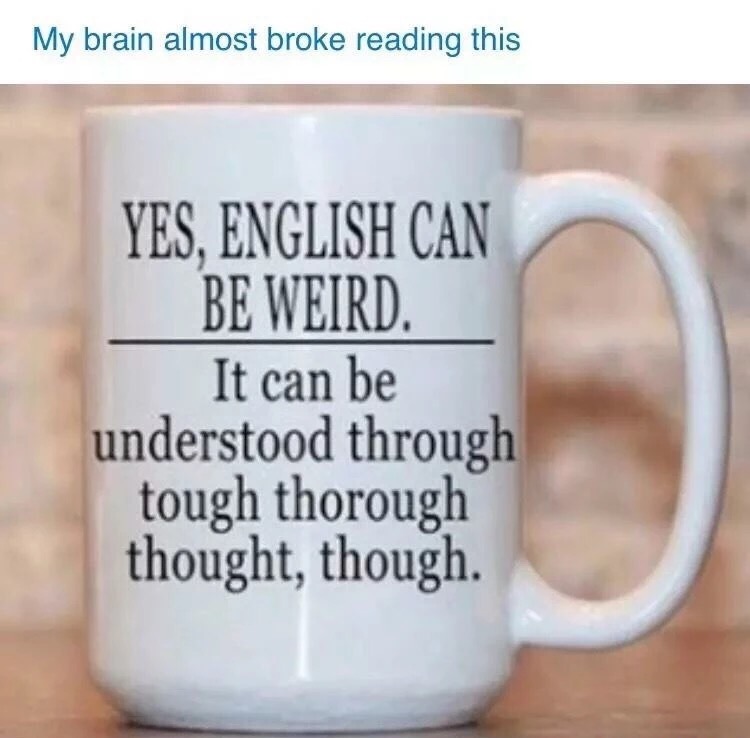 Coffee mug that explores the English language on just on side of the cup.