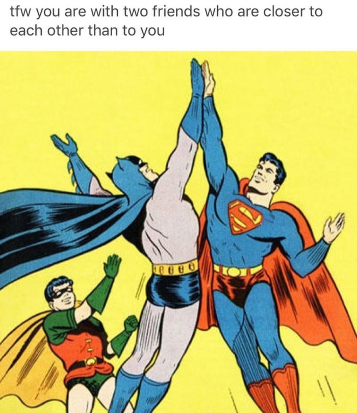 Batman and Superman giving each other high 5