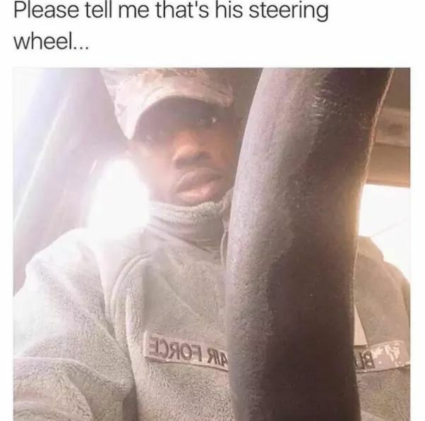 better be a steering wheel - Please tell me that's his steering wheel...