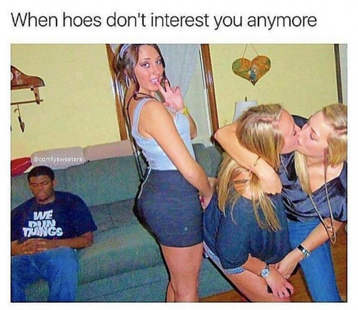 Dude passed out on the couch as girls play around with a caption of not being interested in hoes anymore.