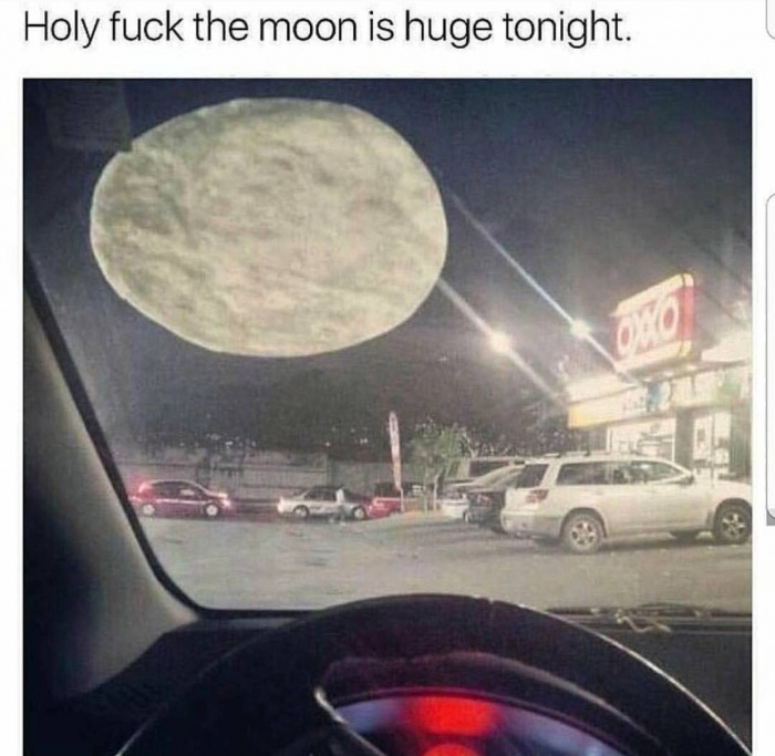 Meme of a huge moon which is just a tortilla against the window.