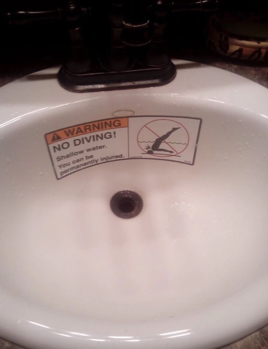 Sink that tells you to not dive into it.